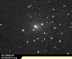 El cometa Tempel 1, visto a travs de un telescopio refractor de 10 centmetros.
<i>Crdito: Mike Holloway de Van Buren, Arkansas.</i>
[<a href=http://science.nasa.gov/headlines/y2005/images/deepimpact/holloway.jpg target=_blank>imagen ms grande</a>]

