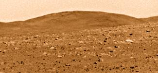 Las colinas Columbia surgen con creciente detalle en el emplazamiento del explorador Spirit, el cráter Gusev. Ver imágenes del Spirit y muestra de diapositivas. Fuente: NASA/JPL