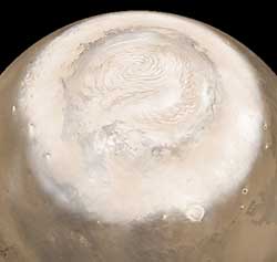 Nubes y cubierta de hielo del polo norte marciano desde la Mars Orbital Camera (cmara orbital de Marte]. 
Crditos: NASA/JPL/MSSS MOC
