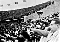 La primera transmisión de TV de la tierra, los juegos de Berlín en 1936, y ahora la señal potente más lejana de cualquier planeta emisor de ondas electromagnéticas. Debido a la segunda guerra mundial, éstos fueron los últimos juegos hasta 1948. “Éstos no son grandes ejemplos de nuestra civilización”. Woody Sullivan. Créditos: Archivos nacionales, USHMM. Archivos fotográficos.