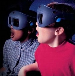 Cmo ver una pelcula 3D sin aquellas gafas rojas y azules? Algunas salas IMAX 3D usan gafas con lentes obturadoras electrnicas de cristal lquido. Un radioenlace con el proyector hace que estas lentes conmuten entre opacas y transparentes en sincronizacin con el obturador del proyector, mostrando as a cada ojo solamente la imagen adecuada Presto! ... 3D a todo color. Imagen Copyright  2002 IMAX Corp. <A HREF=http://www.imax.com/body.html?p=/experience/imax_3d.html&s=auto target=_blank>(aprender ms)</A>