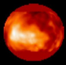 Imagen de Titn del Telescopio Espacial Hubble. La zona brillante (aproximadamente del tamao de Australia) podra ser un continente, un ocano, un rea de impacto. Nadie sabe. <A HREF= http://photojournal.jpl.nasa.gov/catalog/PIA01465 target=_blank>[ms]</A>
