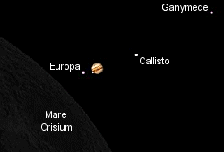 Júpiter y sus lunas al final del eclipse. Pulse <a href=http://science.nasa.gov/headlines/y2004/images/moonjupiter/JUP_OCC.GIF target=_blank><u>aquí</u></a> para ver una animación creada por el artista y astrónomo <a href=http://celestialdelights.info/ target=_blank><u>Frank Reddy.</u></a>